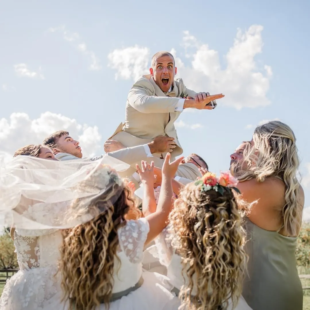 Wedding party dressed by Jason Louis Green Bay