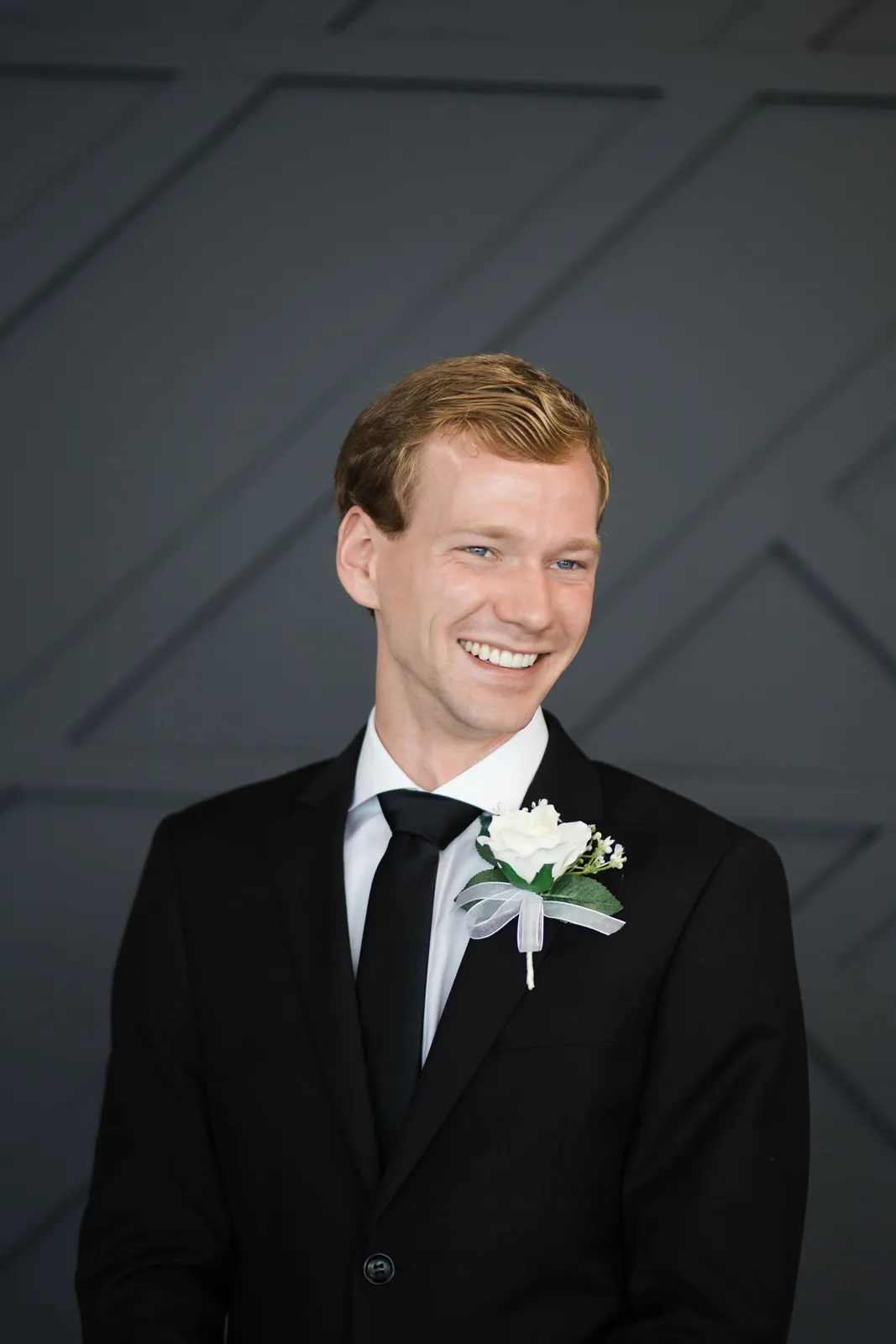 Groomsmen in coordinated formal wear