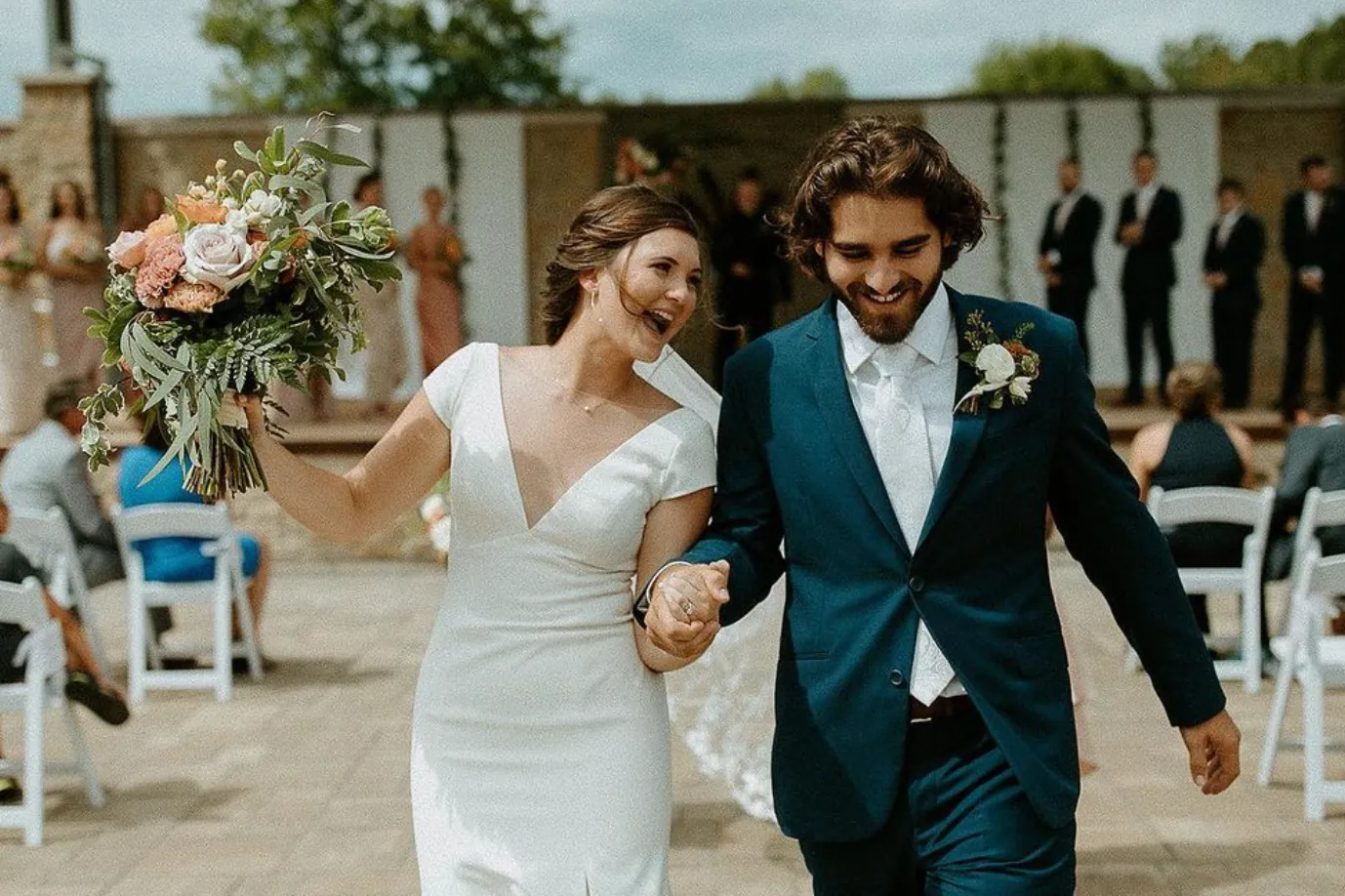 Wedding party in coordinated suits