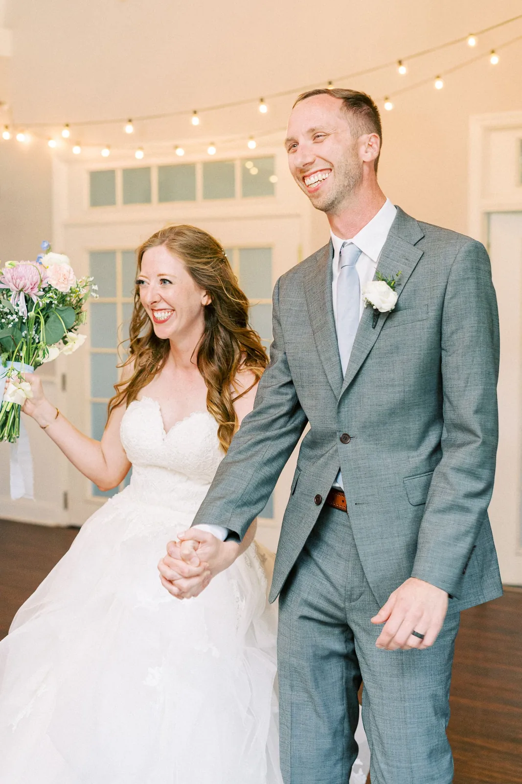 Groom and wedding party in tailored suits