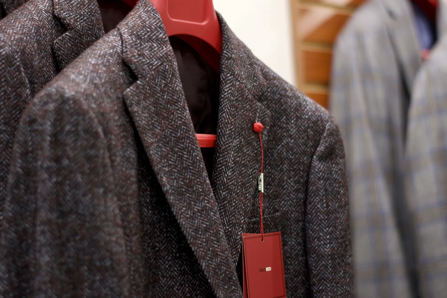 Charcoal tailored jacket with red accent detail