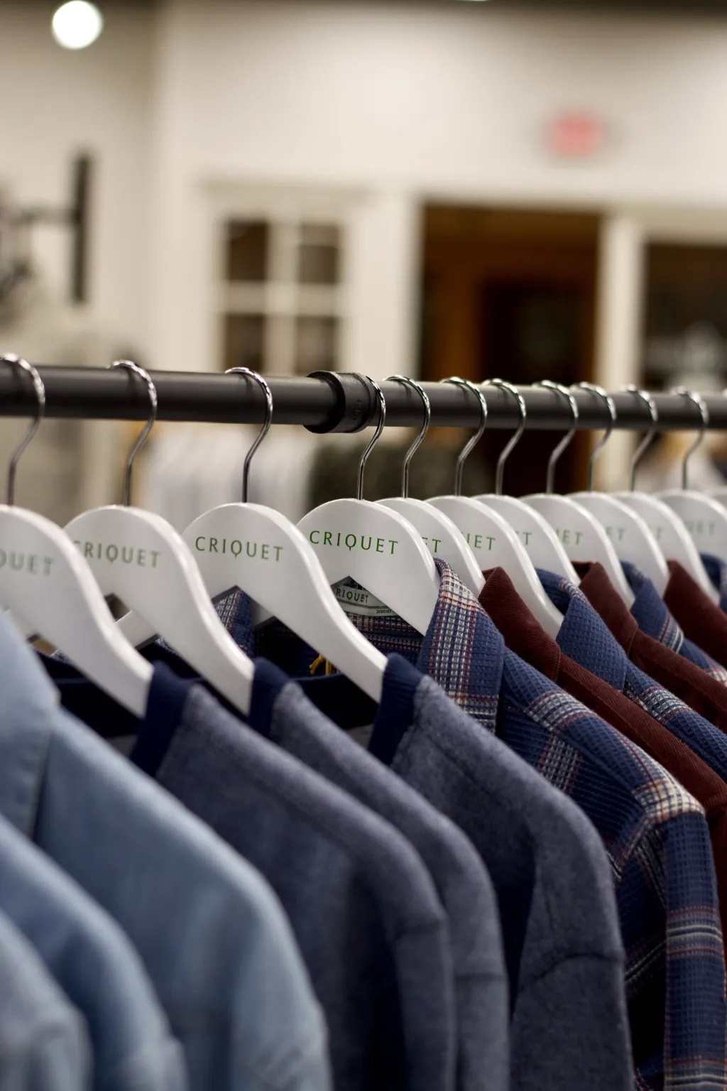 Seasonal shirts displayed at Jason Louis Mequon
